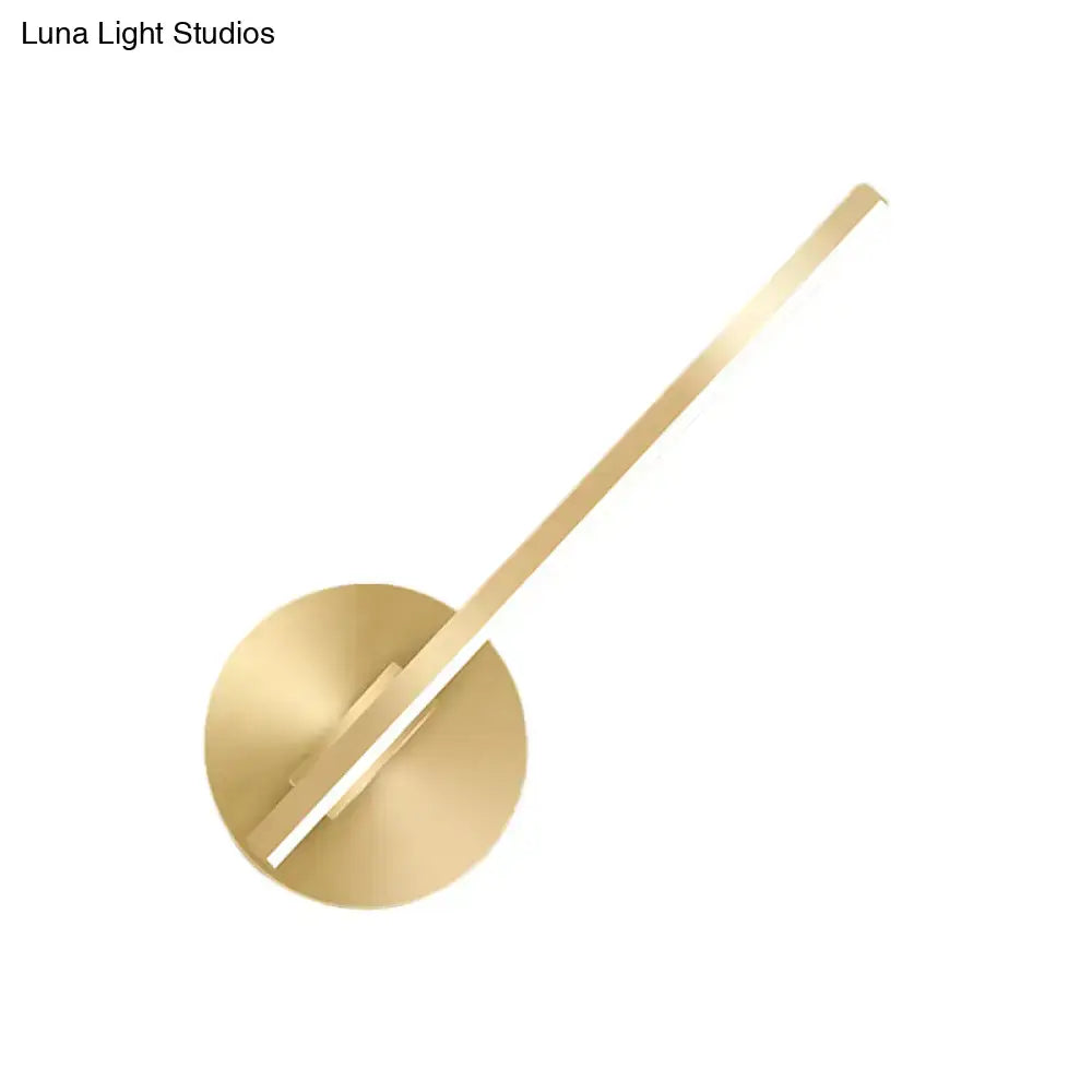 Modern minimalist gold tube stick wall sconce with sleek circular base and elongated arm for bedroom led lighting
