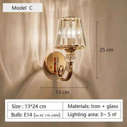 Modern minimalist gold wall lamp with faceted crystal glass shade and decorative crystal accents for bedroom use