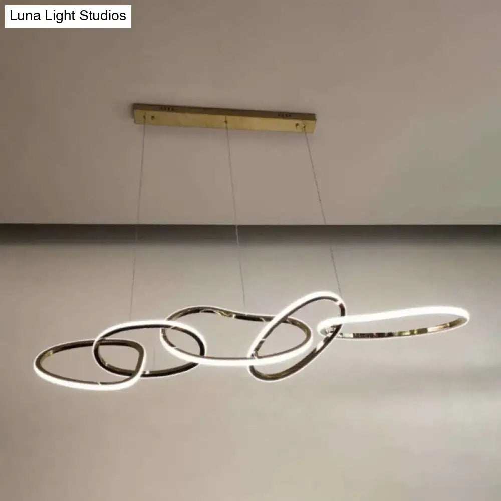 Modern minimalist golden led hanging light with interlocking circular rings for dining room lighting