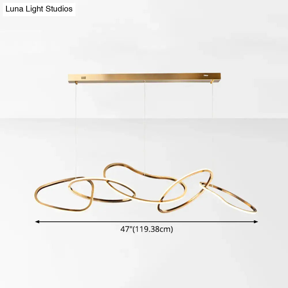 Modern minimalist golden led hanging light with interlocking circular rings and sleek rectangular ceiling mount for dining room