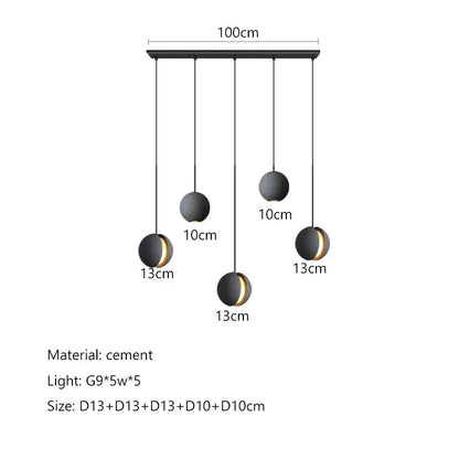 Modern minimalist gray and gold pendant light with black spherical matte finish and gold accents by decorbites cement planet chandelier