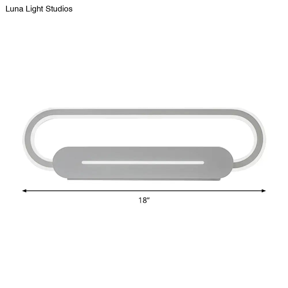 Modern minimalist gray acrylic oval led wall sconce with sleek design for bedroom lighting