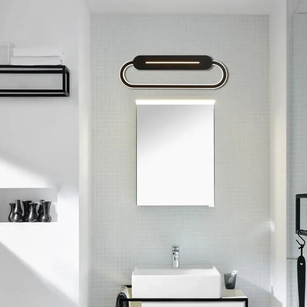 Modern minimalist gray acrylic oval led wall sconce with black and chrome finish for bedroom or bathroom lighting