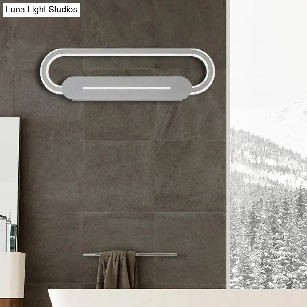 Modern minimalist gray acrylic oval led wall sconce with a sleek silver oval led design for bedroom lighting
