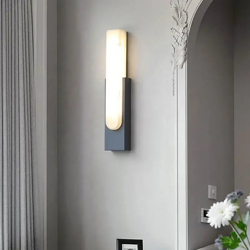 Modern minimalist grey metal wall sconce with frosted glass panel for bedroom lighting decorbites grey metal design