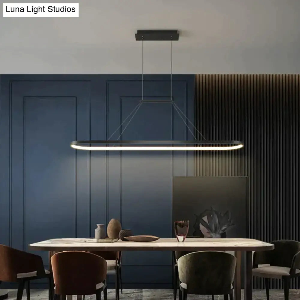 Modern minimalist led black rectangular pendant light with integrated led lighting for dining room use