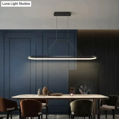 Modern minimalist led black rectangular pendant light with integrated led lighting for dining room use