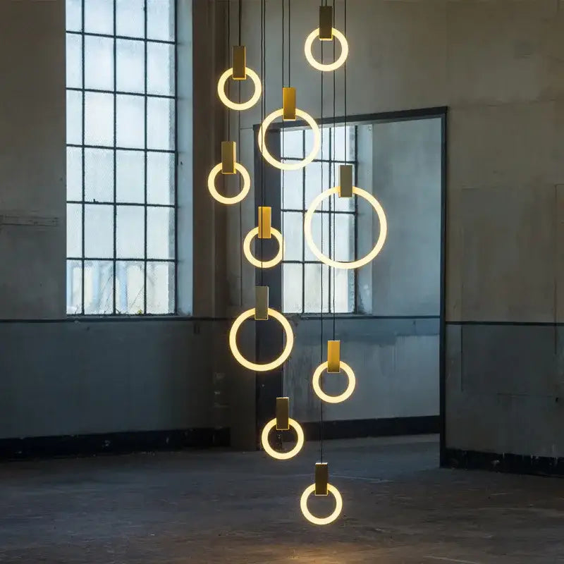 Modern minimalist led wooden staircase ceiling lights featuring warm golden circular rings and brass fixtures for dining room decorbites led wooden