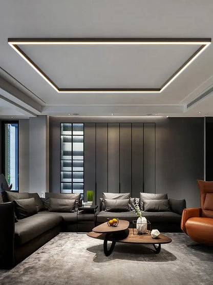 Modern minimalist coffee table with sleek dark wood top and black metal legs complements decorbites led ceiling lamp