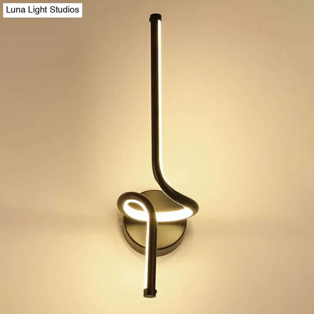 Modern minimalist metallic led wall sconce with sleek curved design and warm lighting for bedroom linear illumination