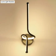 Modern minimalist metallic led wall sconce with sleek curved design and warm lighting for bedroom linear illumination