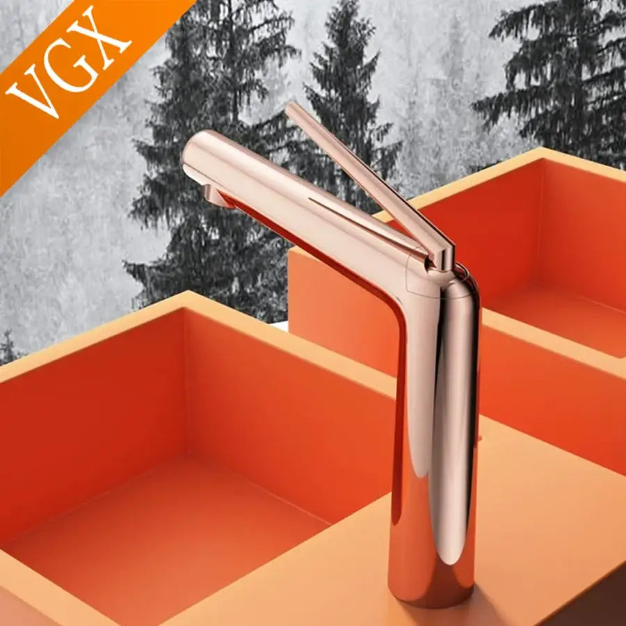 Modern minimalist rose gold basin faucet with sleek polished metallic finish and single handle for cold water control
