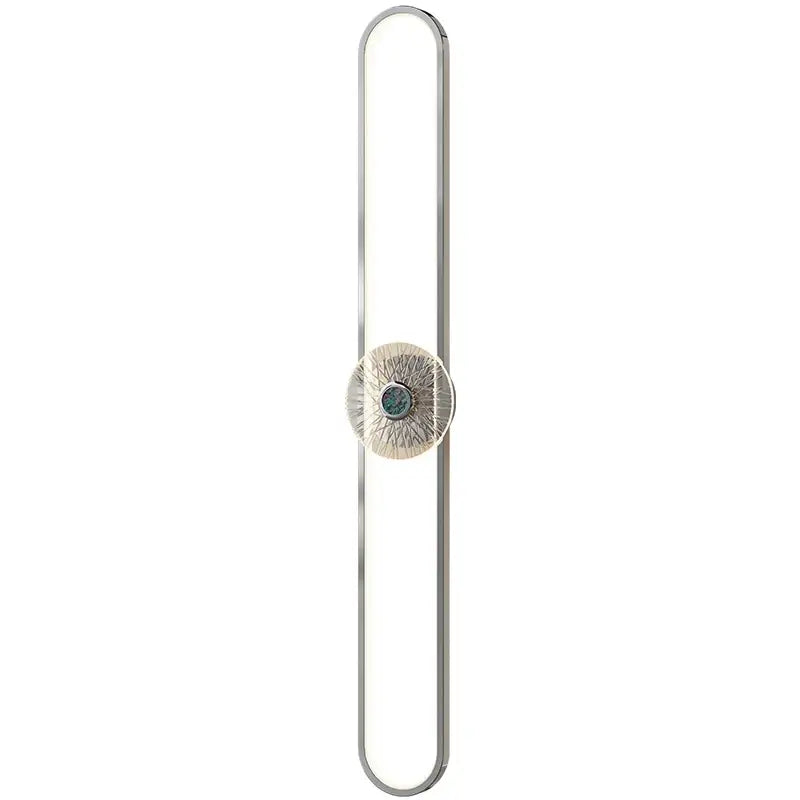 Modern minimalist silver-toned led strip wall light with elongated oval frame and teal gemstone medallion for living room decorbites led strip