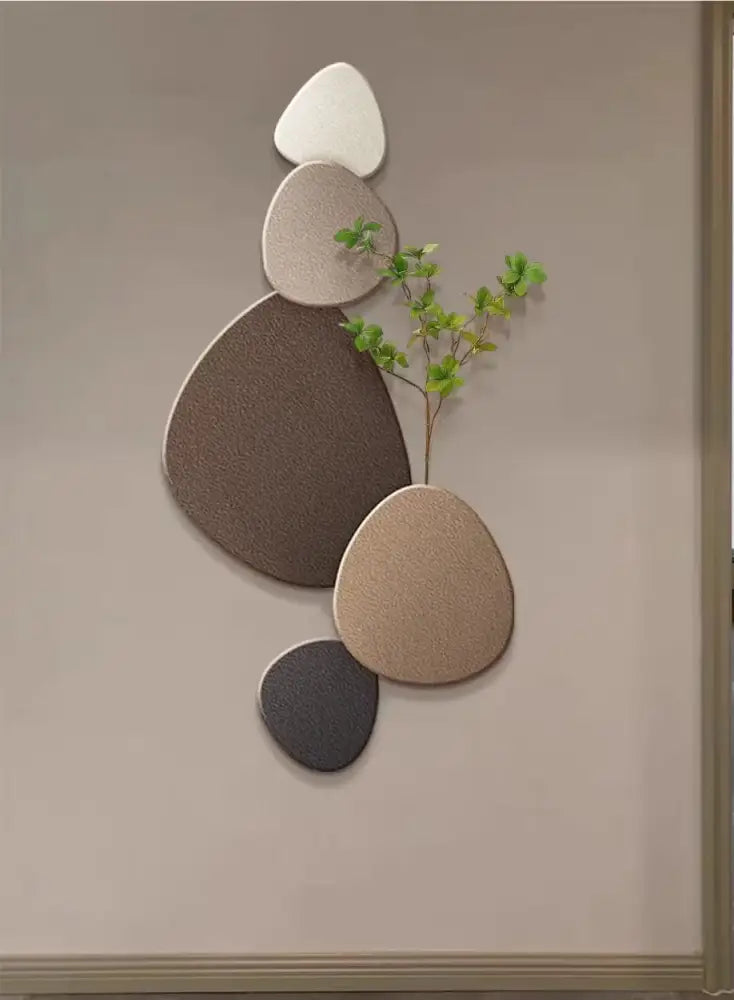 Modern minimalist wall lamp with five stacked textured stone plaques in neutral tones for decorbites green plant mural