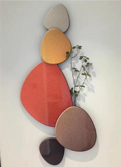 Modern abstract wall lamp with overlapping textured oval panels in earth tones decorbites green plant mural decor