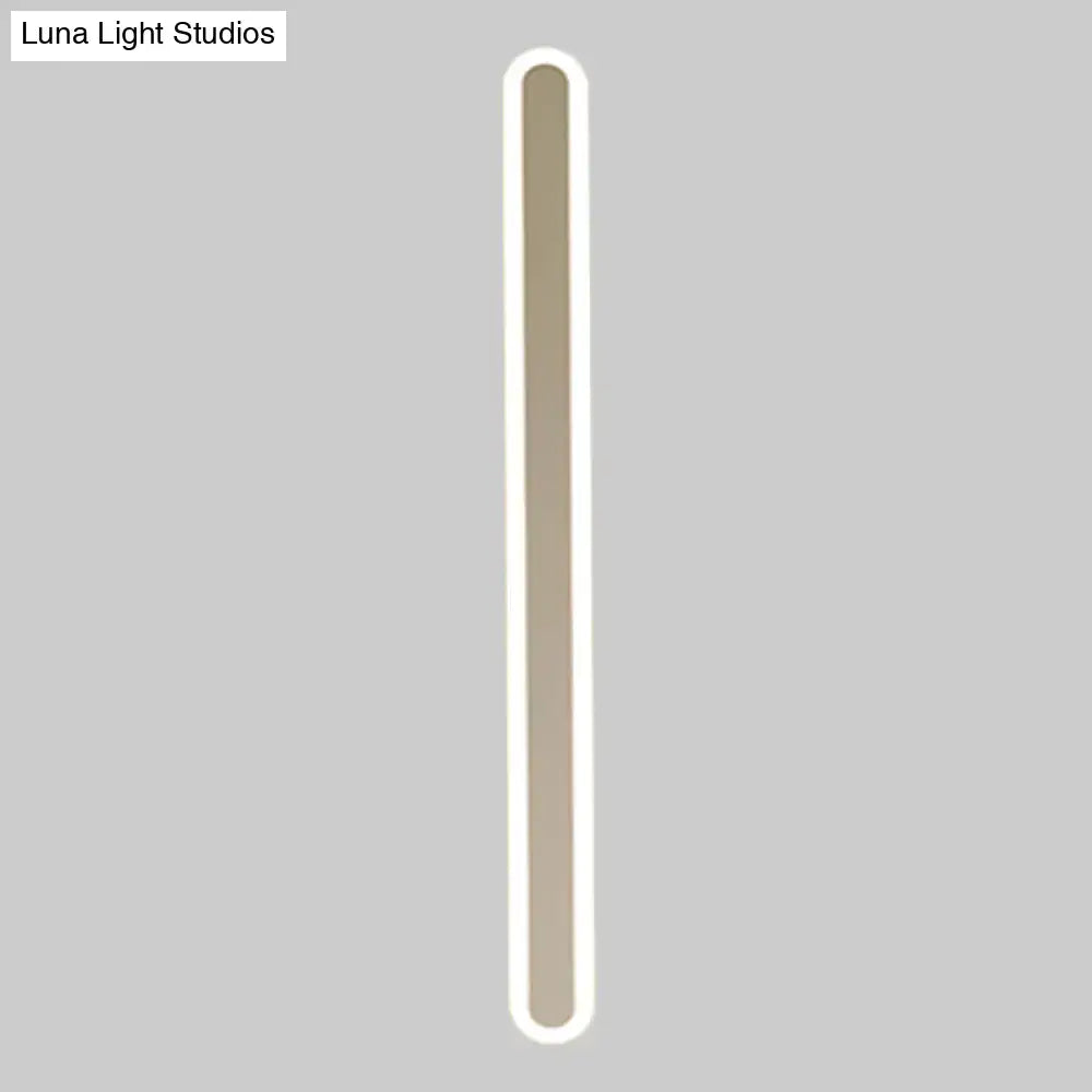 Modern minimalist white and beige wall light with warm central panel and glowing border perfect choice for bedroom light fixture