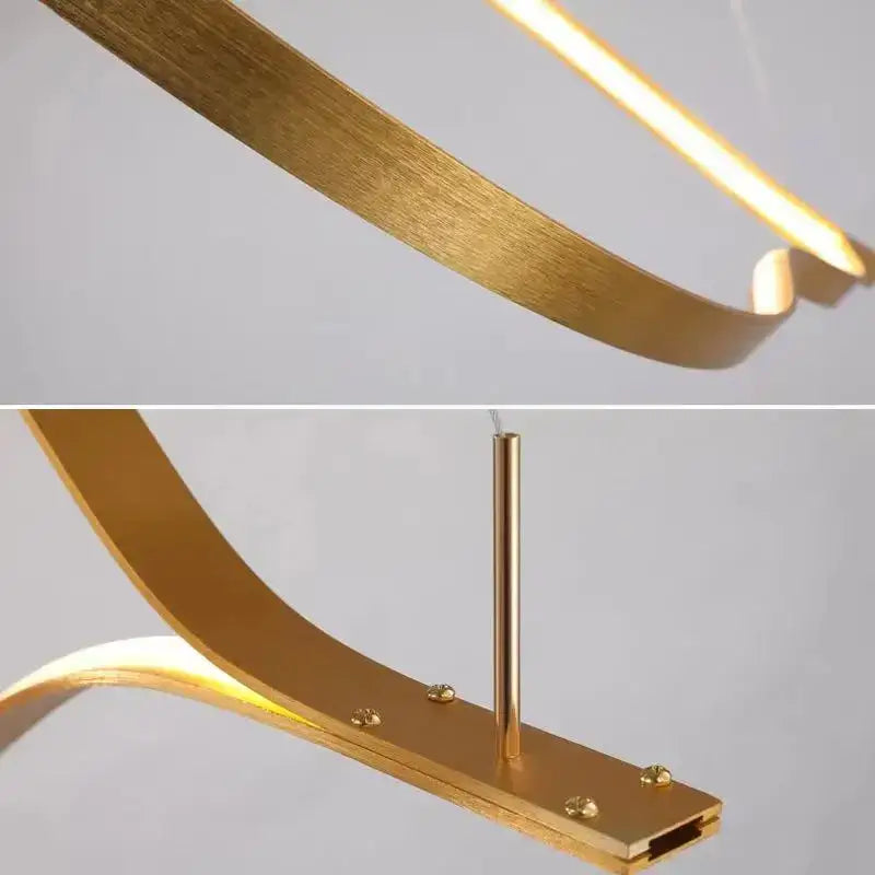 Modern gold finished metal pendant light with sleek curved design and integrated led lighting for decorbites lip shaped chandelier