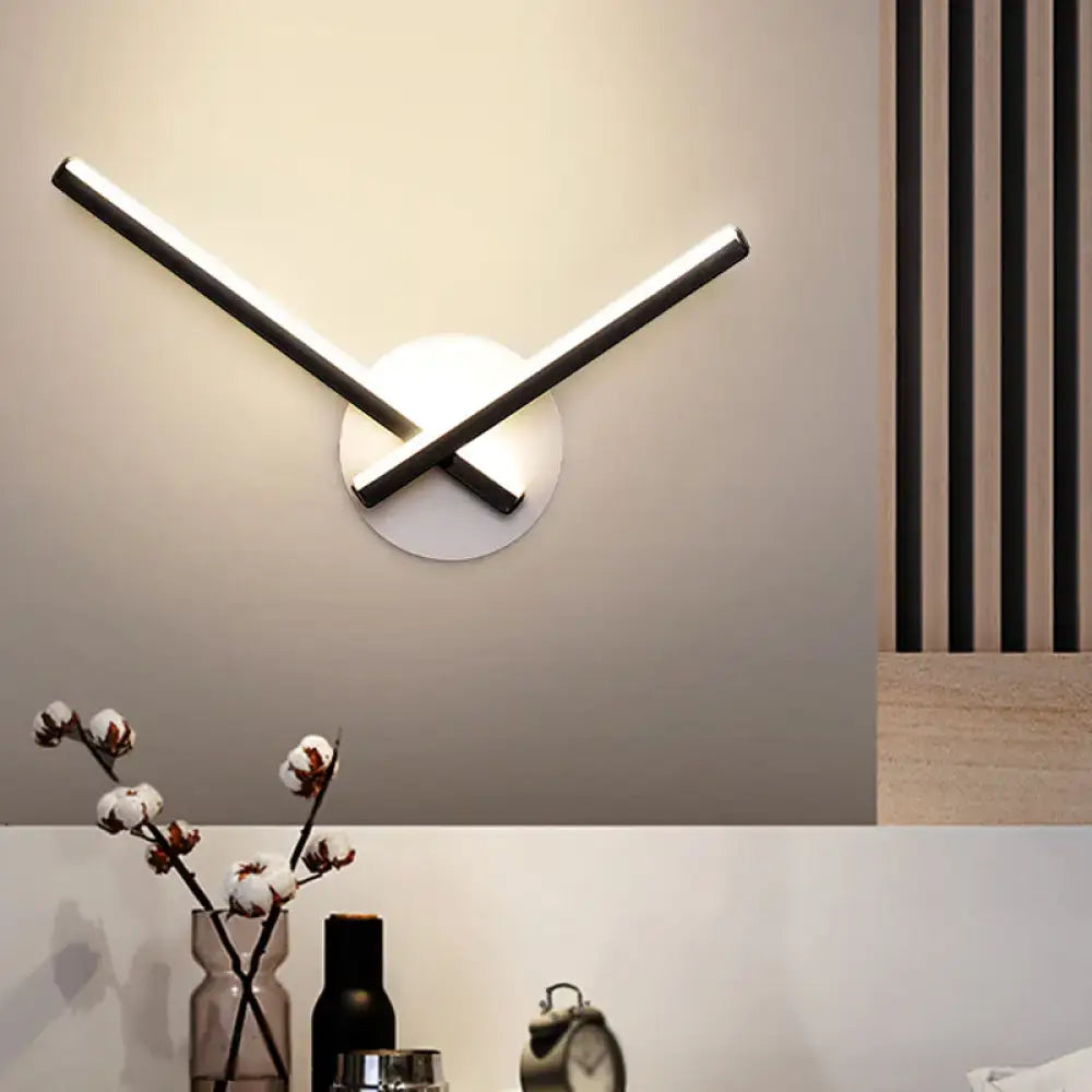 Modern minimalist white ceiling light with sleek black and white illuminated arms direct wired electric maximum bulb wattage
