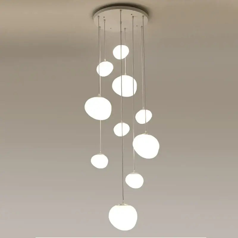 Modern minimalist white cobblestone glass led pendant light with spherical design and metallic rods for stairway decorbites pendant light