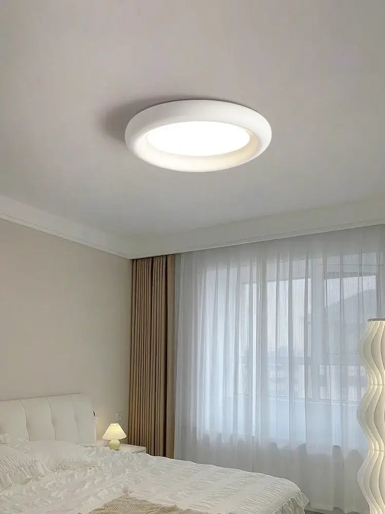 Modern minimalist white cream led ceiling lamp for bedroom featuring a sleek circular design decorbites cream led ceiling lamp