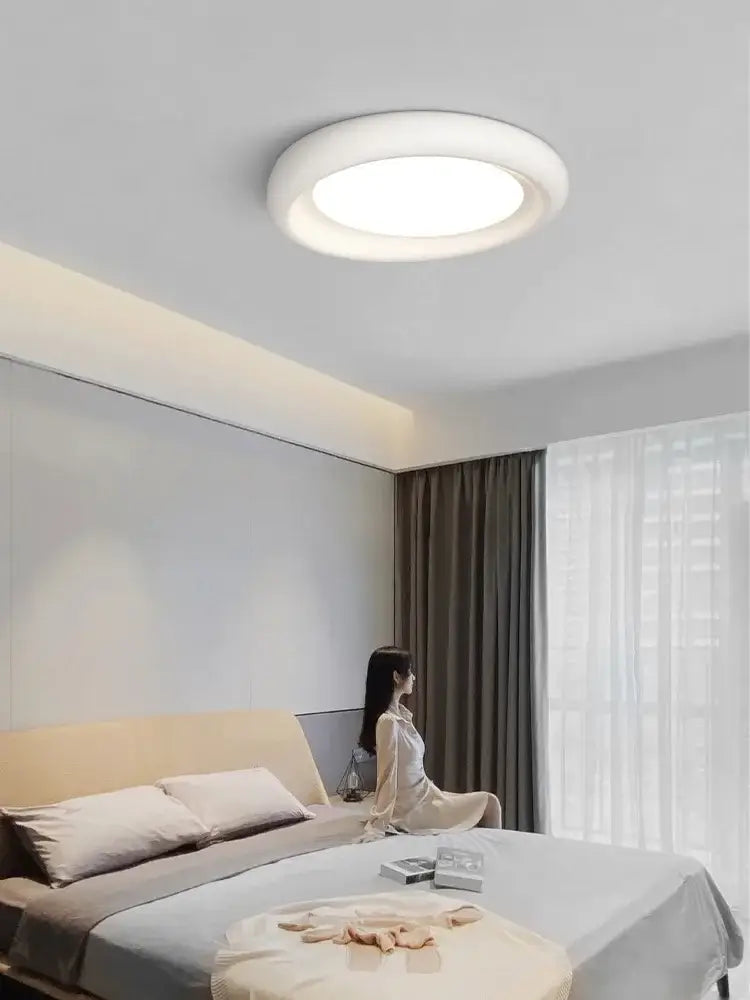 Modern minimalist white cream led ceiling lamp with sleek circular design for bedroom decorbites cream led ceiling lamp