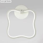 Modern minimalist white curved square led wall sconce with smooth wavy rectangular frame and circular mounting plate