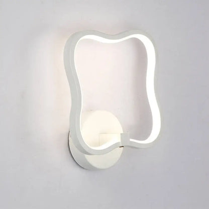 Modern minimalist white curved square led wall sconce with a wavy rectangular frame for bedroom lighting