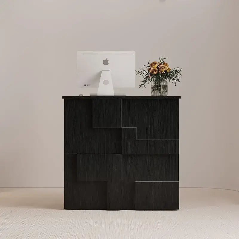 Modern minimalist black geometric-patterned desk with matte finish and layered panels for living room lockers