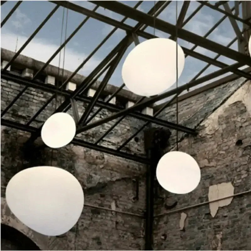 Modern minimalist white glass ball led pendant lights hang from metal ceiling structure for living room decorbites pendant lights