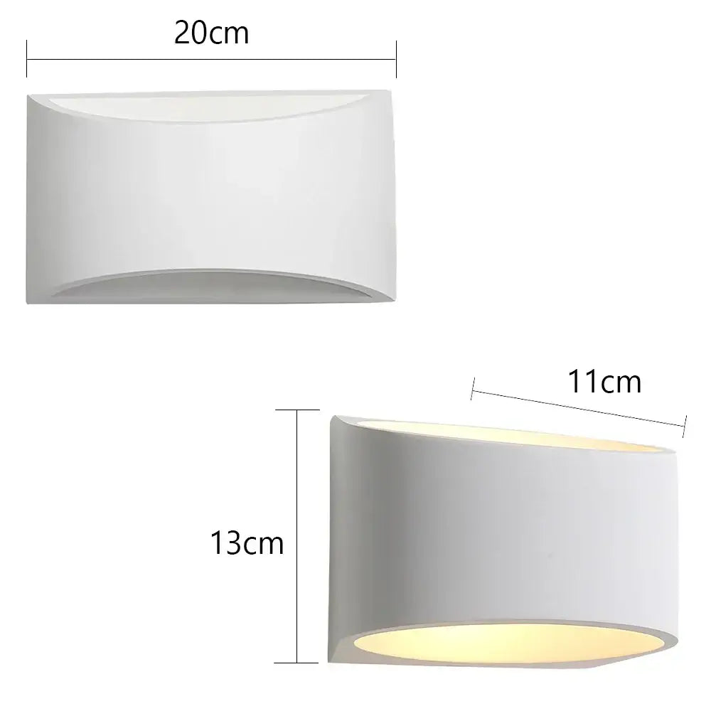 Modern minimalist white gypsum led wall lamp with sleek curved design and warm interior light for bedroom lighting