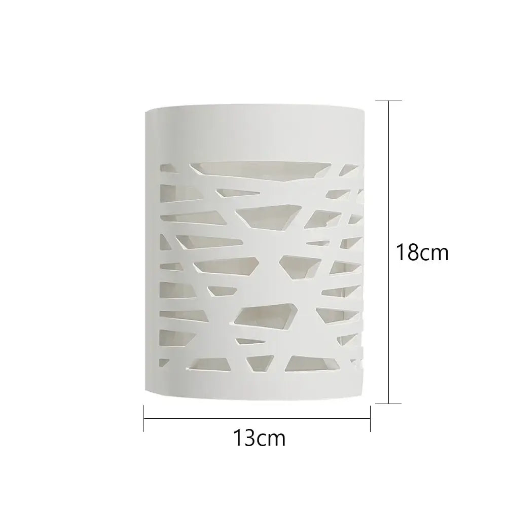 Modern minimalist white gypsum led wall lamp featuring a cylindrical candle holder design with geometric cut-out pattern