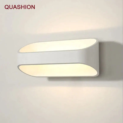 White quashion wall lamps with sleek oval led panels designed for modern minimalist bedroom and corridor lighting living space