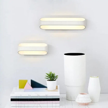 Modern minimalist white led wall lamps with sleek rectangular bodies providing warm diffused lighting for bedroom corridor lighting