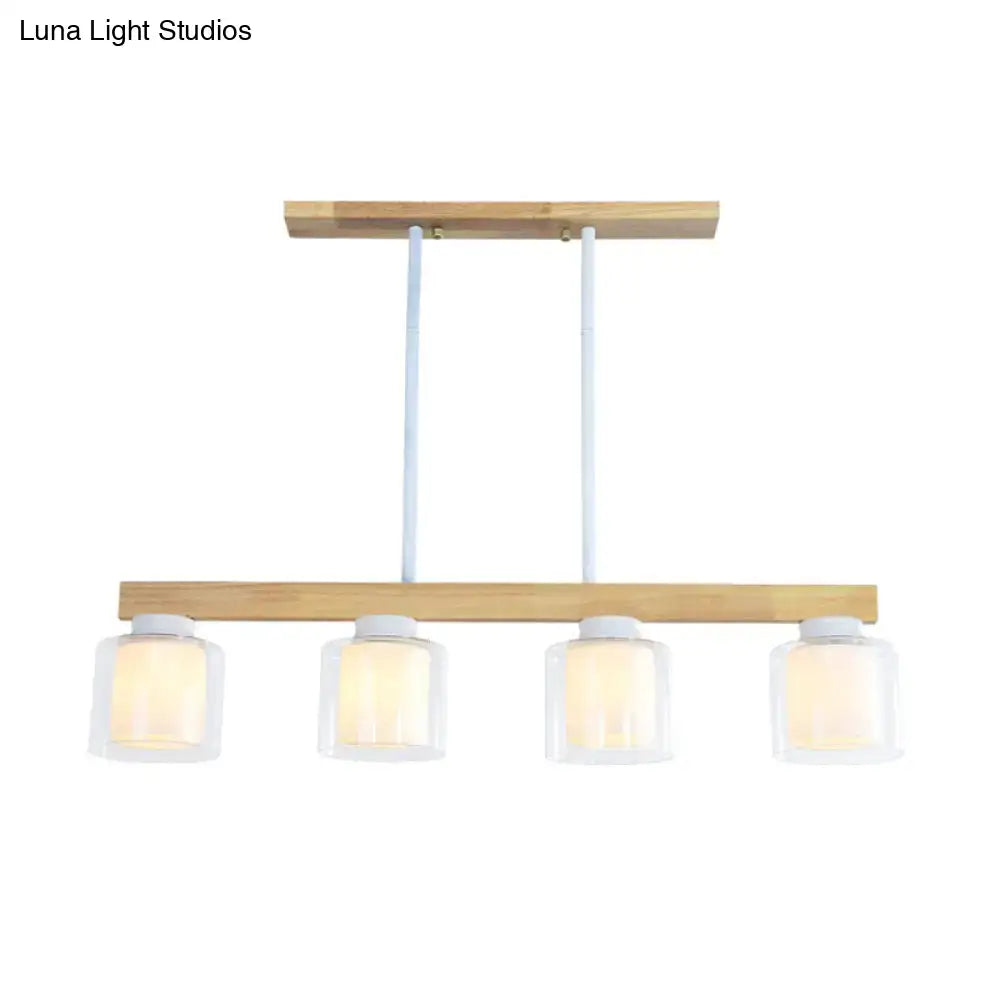 Modern minimalist wood pendant light with white glass shades designed for heads dining room illumination