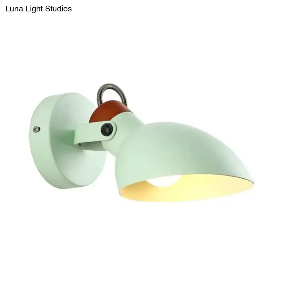 Modern mint green metal wall mounted sconce light with wooden accent and adjustable arm inch fixture for bedroom use