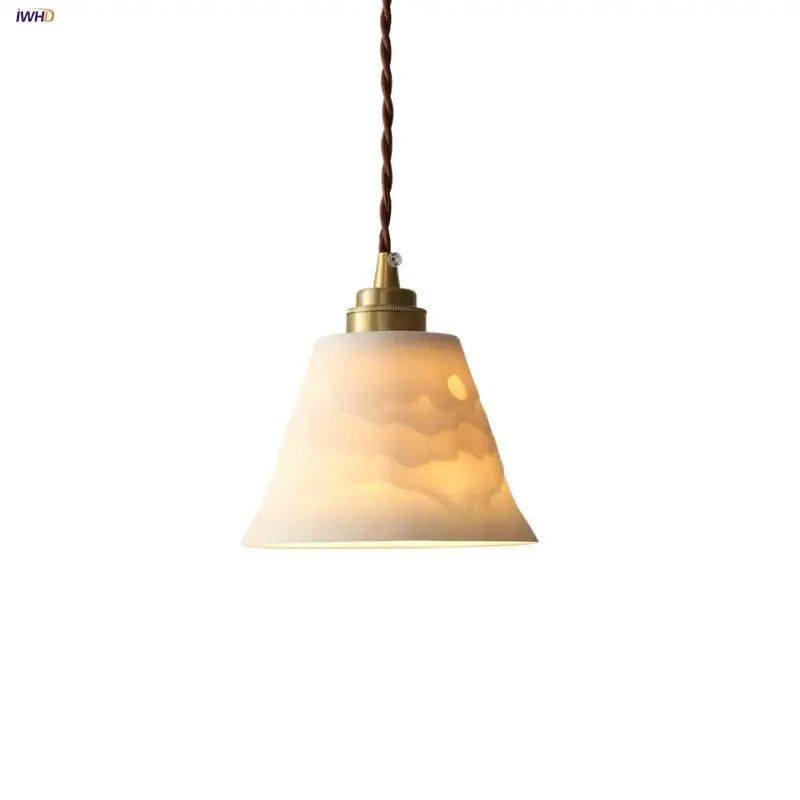 Modern moon ceramic led pendant lamp with warm-toned translucent glass and twisted brown cord for dining room decorbites ceramic led