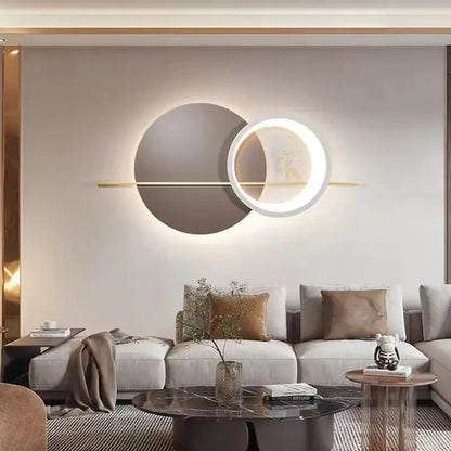 Modern moon deer wall light with sleek gold bar and two illuminated concentric rings in dark gray and white decorbites deer wall light