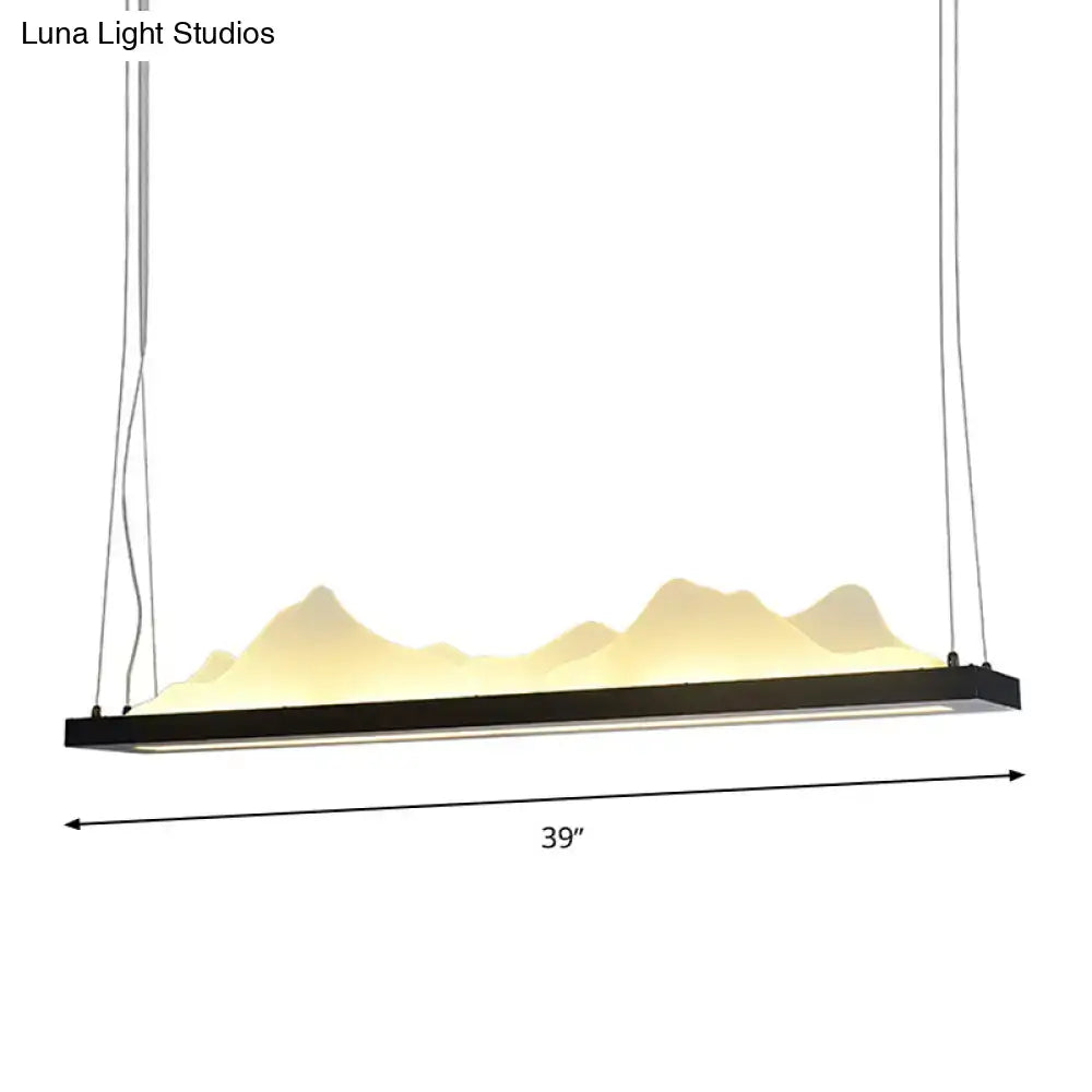 Black rectangular DecorBites™ modern acrylic LED island light fixture with glowing mountainous silhouette and 31.5’’/39’’ fixture width