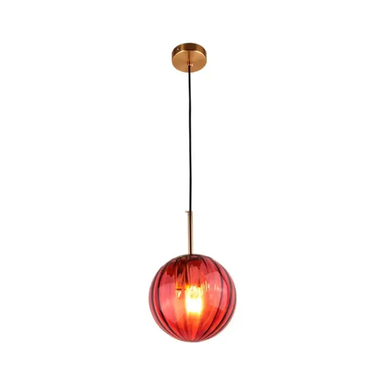 A vibrant red ribbed glass ball pendant lamp with brass finish decorbites glass ball ceiling mount for dining room decor