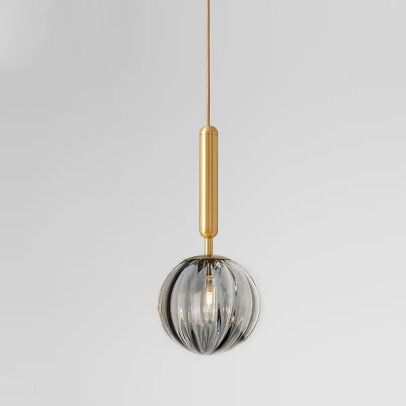 Modern multi color glass pendant light with painted iron finish gold rod and smoky gray ribbed glass globe for dining room