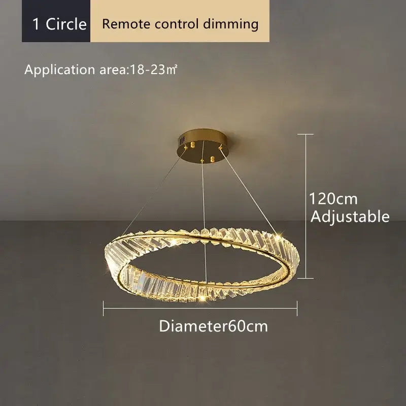 A modern gold-toned decorbites crystal led chandelier with faceted crystals and warm light for dining room use