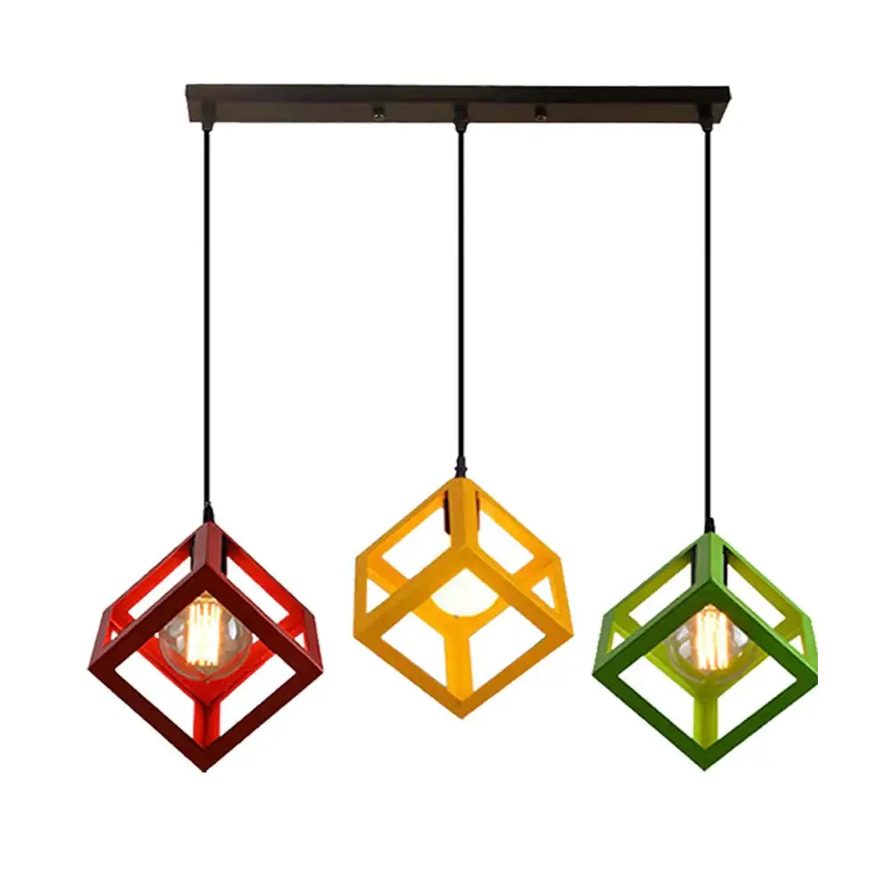 Set of three colorful pendant lights with red yellow and green geometric cube frames for modern kitchen decorbites geometric cube decor