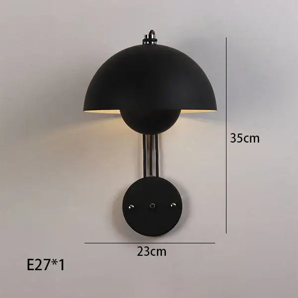 Black matte wall lamp with mushroom dome and circular base, a decorbites colorful led bedside lamp for modern bedroom decor
