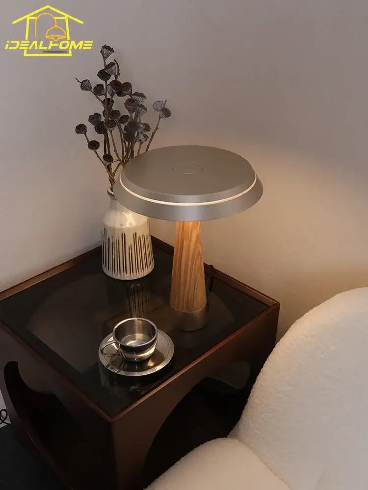 Modern silver-toned table lamp with sleek circular top and solid wood base for bedroom decorbites ceil solid touch led light