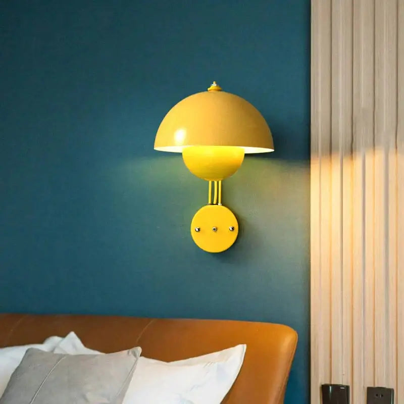 Modern vibrant yellow mushroom wall lamp with glossy finish and brass base type for bedroom lighting