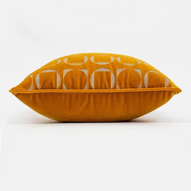 A plush mustard-yellow velvet pillow cover with silver geometric jacquard motifs for modern living room decorbites