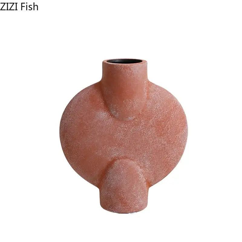 Modern muted tones ceramic disc vase set featuring a terracotta decorbites ceramic disc vase with textured matte finish