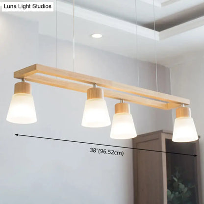 Modern natural wood rectangle island pendant light with four frosted glass shades for pendant lighting in kitchen