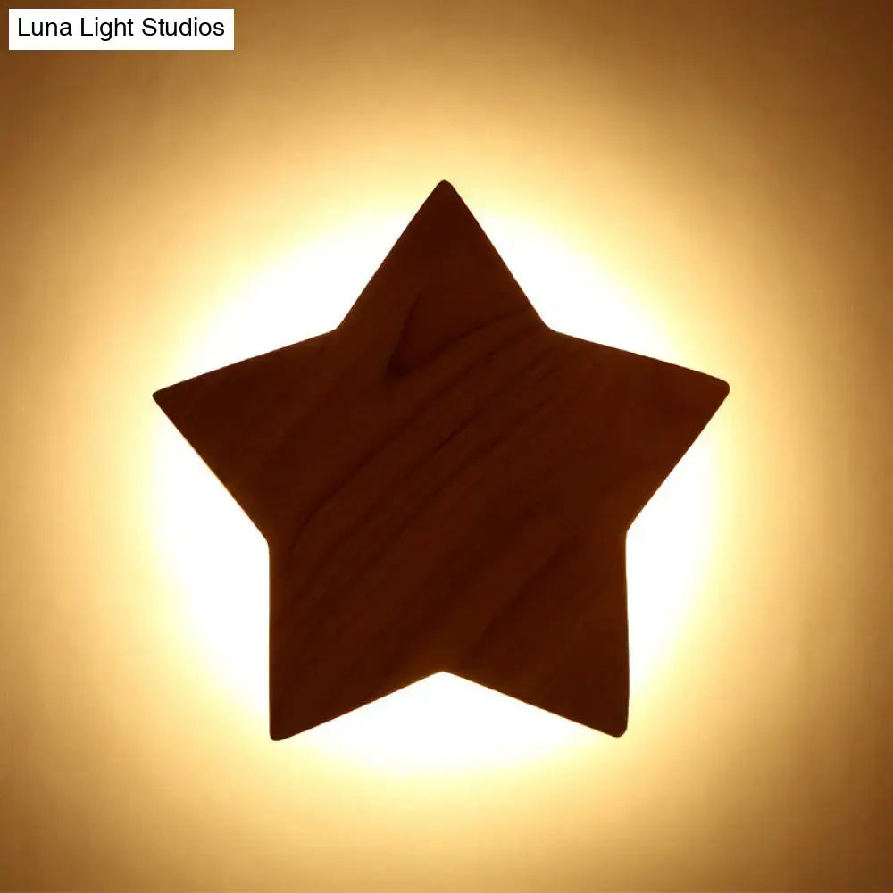 A warm-toned modern natural wood star wall lamp in dark wood with visible grain for living room sconce use