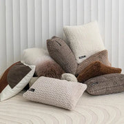 A cozy collection of modern neutral geometric texture plush cushion covers in beige taupe and brown for living room decorbites